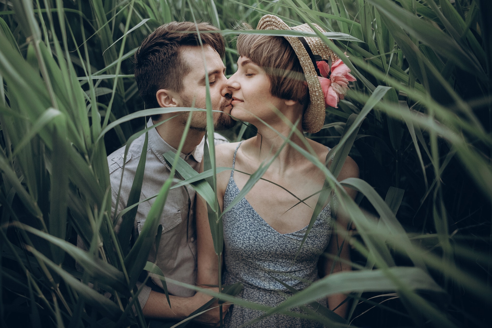 stylish rustic bride and groom embracing in windy high reed 1.jpg