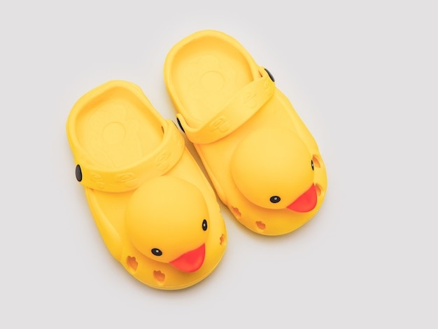 kid s yellow duck shoes isolate